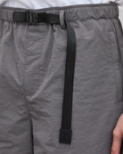 Gray shorts with a black belt and strap