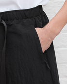 Black shorts with a white background